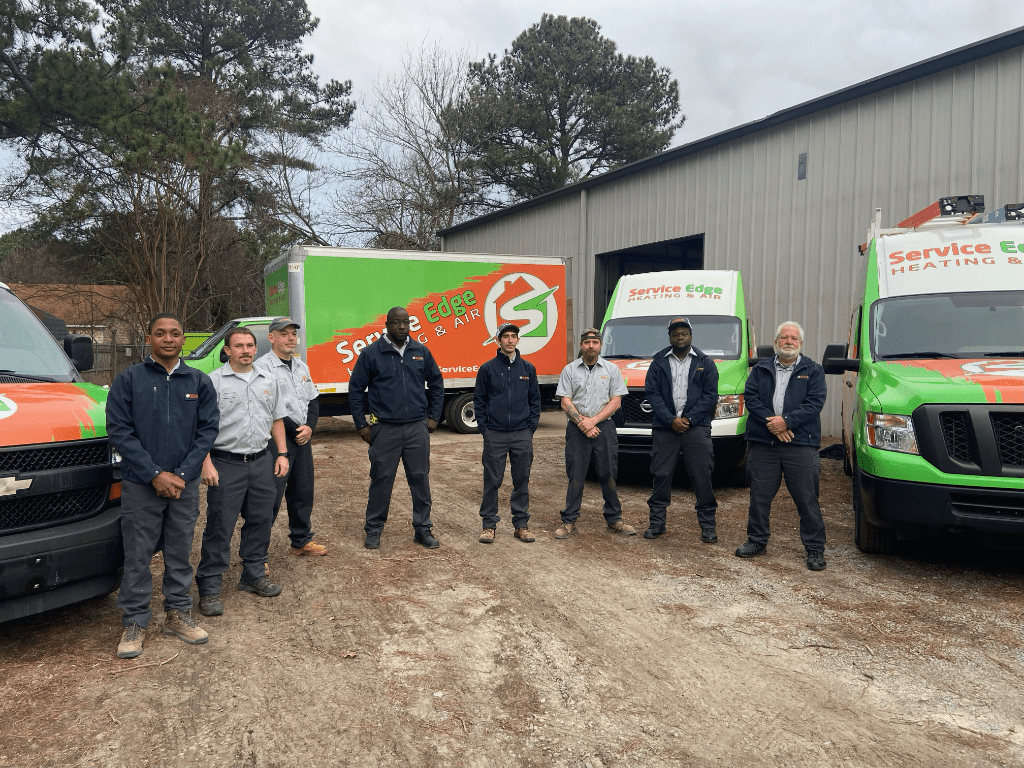 Service edge team in front of trucks